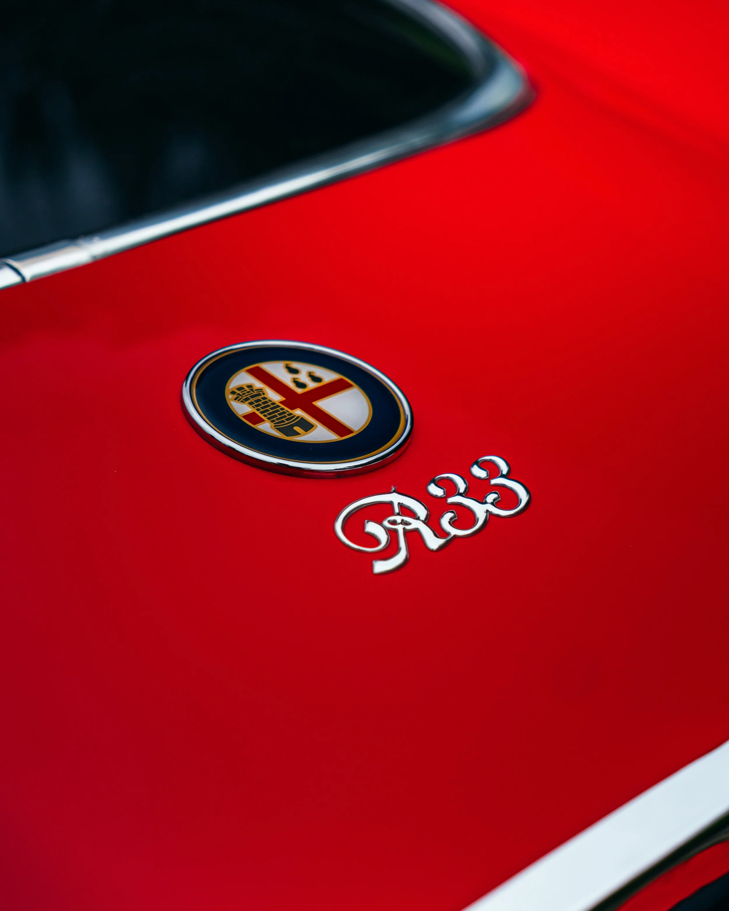 R33 Stradale Badge Shot