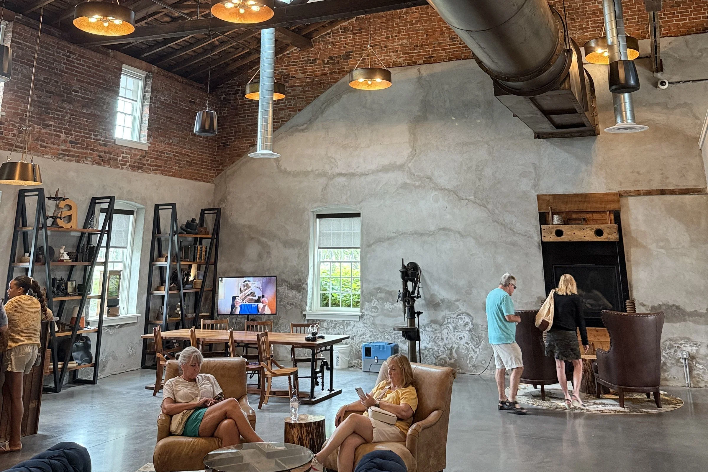 Hotel Millwright, a boutique hotel redeveloped from the 19th-century Amana Woolen Mill complex — the kind of adaptive reuse Hoffman Strategy Group's Lifestyle Hospitality practice advises on.