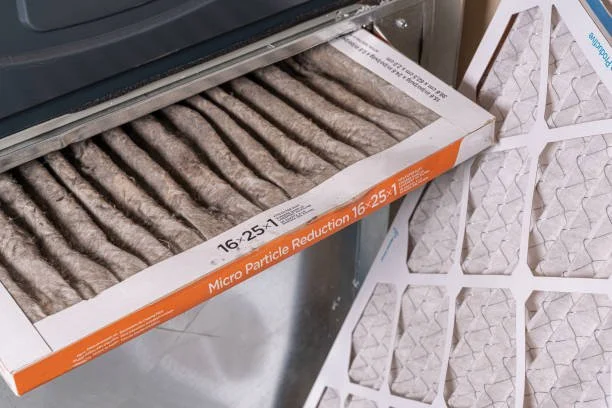 Vacuum cleaner filters in packaging and a filter display.