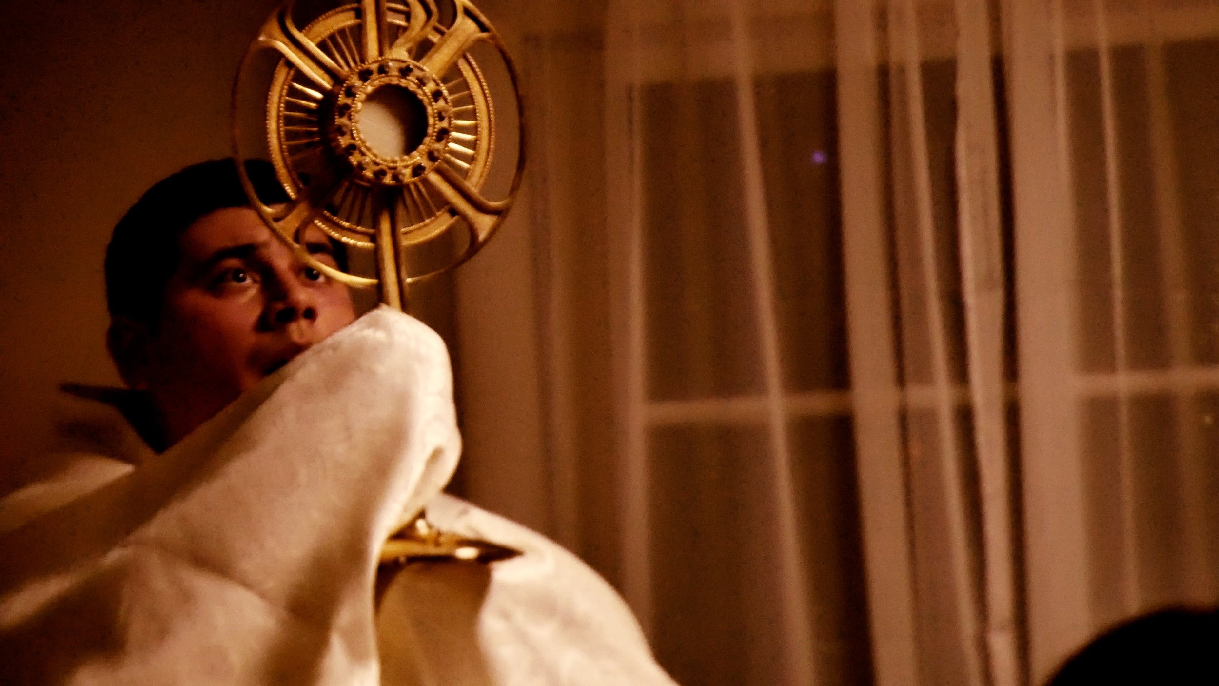 Fr Max looking at Jesus.jpg