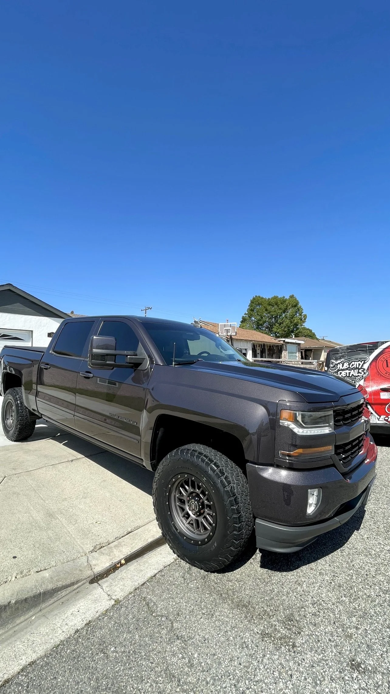 Chevy Silverado truck parked outdoors after professional mobile car detailing service