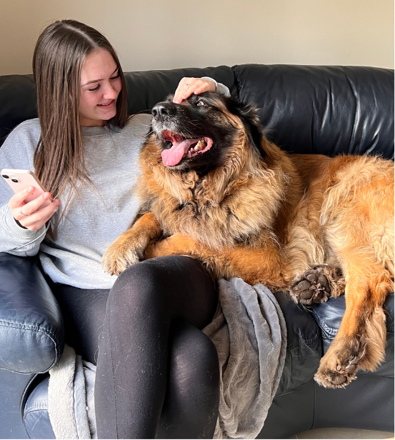 Sammi from Woof Wash Trim with her aunt's Leonberger, an inspiration to setting up a dog grooming business