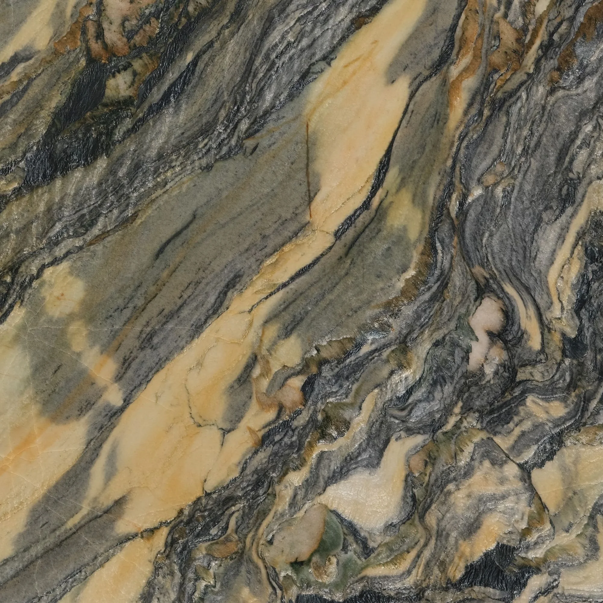 Close-up of a multi-colored, patterned granite surface with black, gray, cream, and gold streaks.