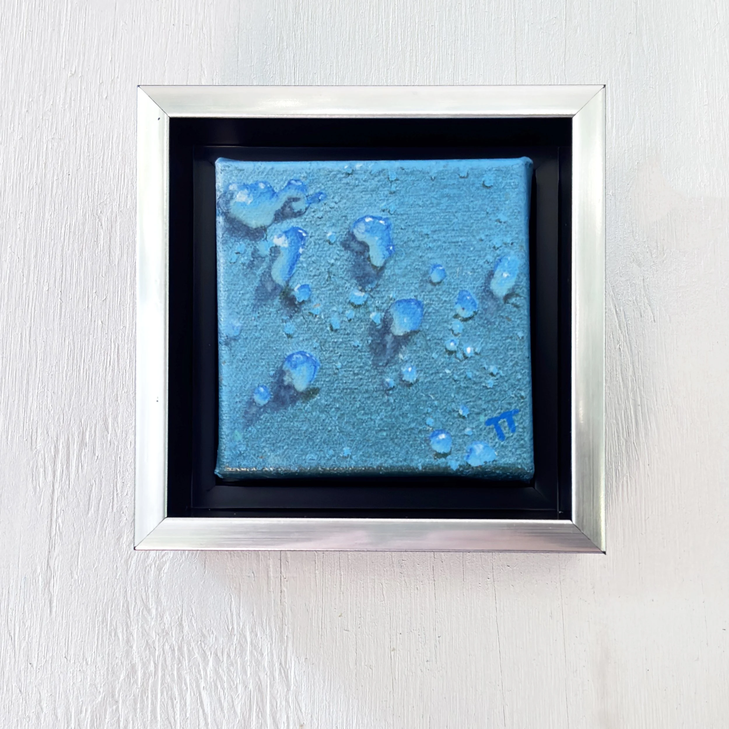 Painting of drops of water on a blue background