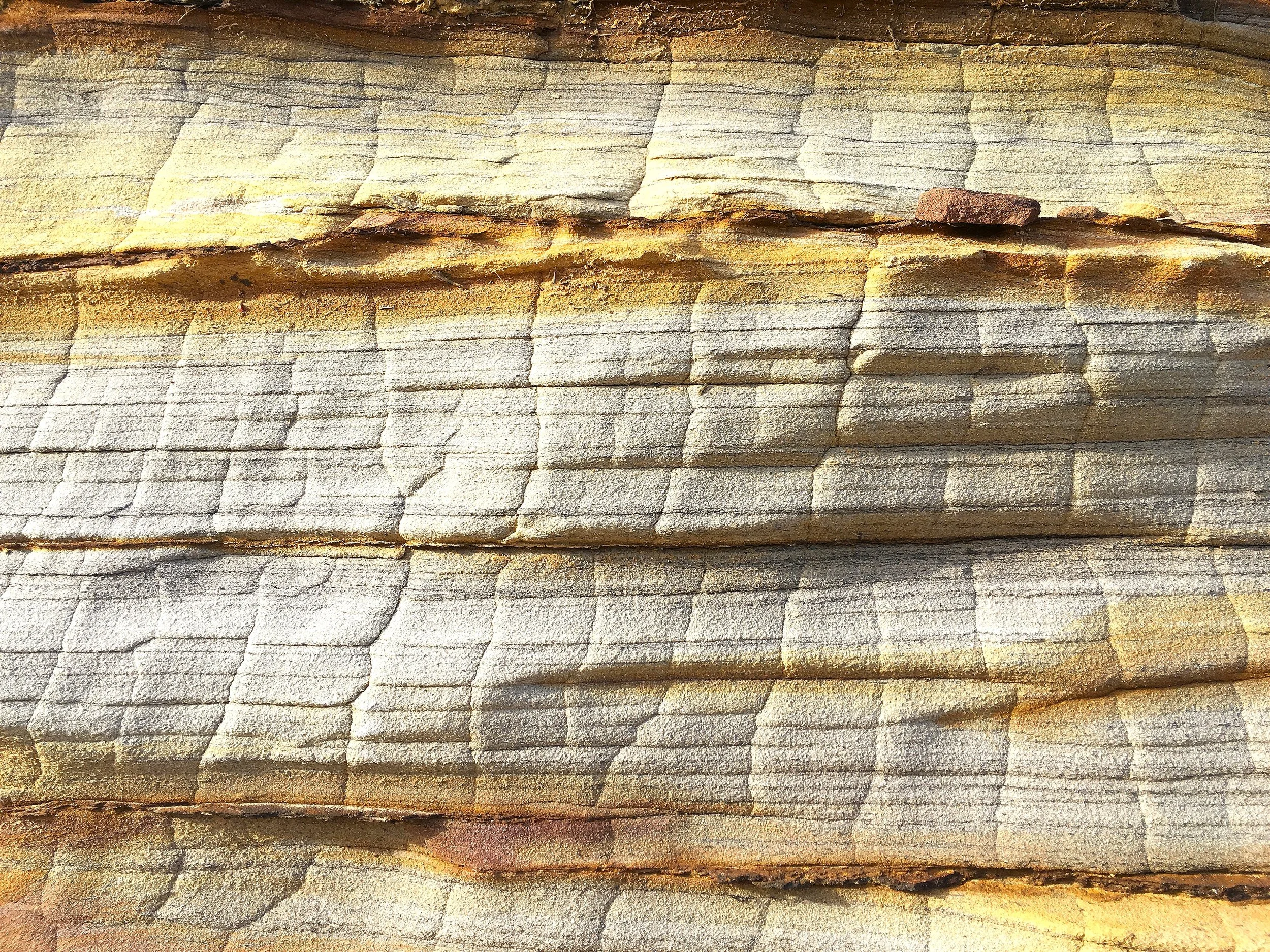 Close-up of wooden planks with visible grain and texture.