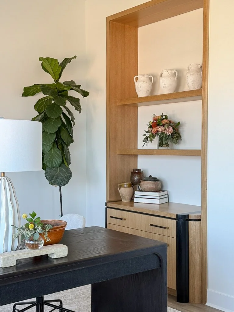 lined white oak built in with shelves black stain detail black desk white wavy porcelain lamp fiddle leaf fig 