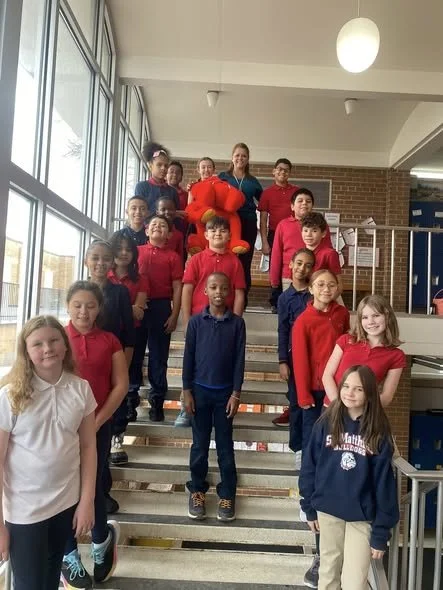 4th grade celebrating the Bull Dog Code and speeches