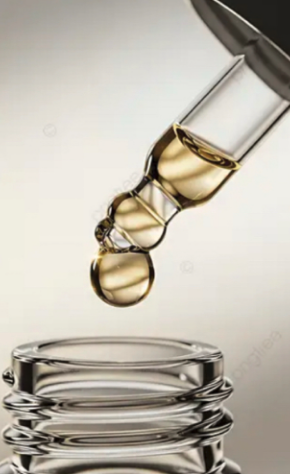 Premium Facial at MoonSun Esthetics - A dropper releasing liquid into a stack of glass petri dishes.