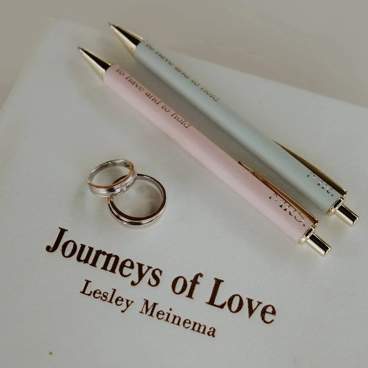 A book titled 'Journeys of Love' by Lesley Meinama, 