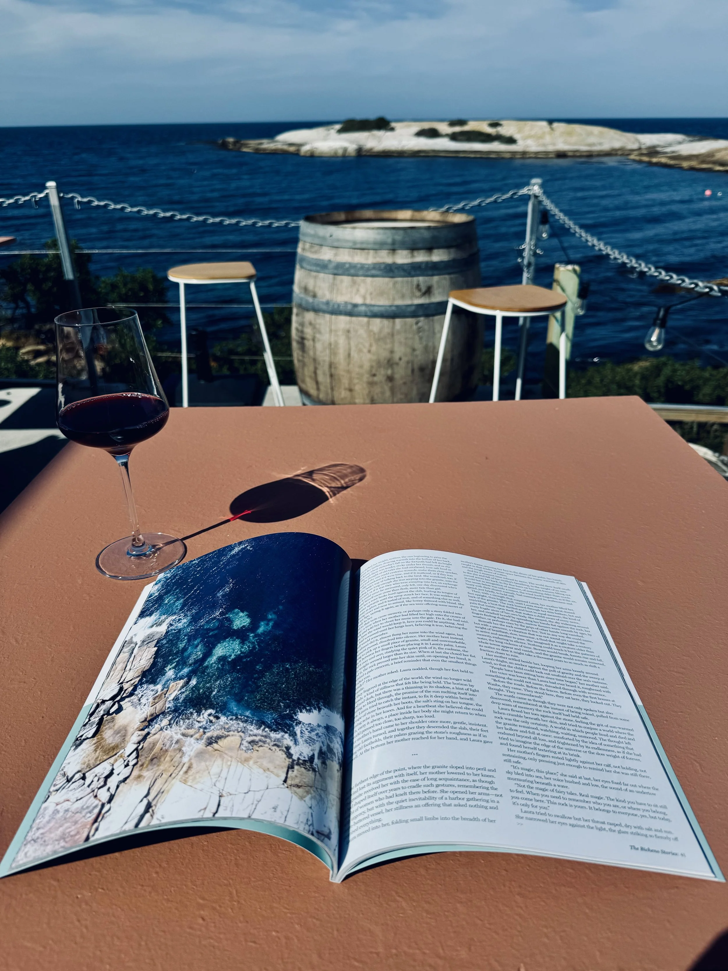 The Bicheno Stories Edition 01 printed magazine photographed in Bicheno Tasmania