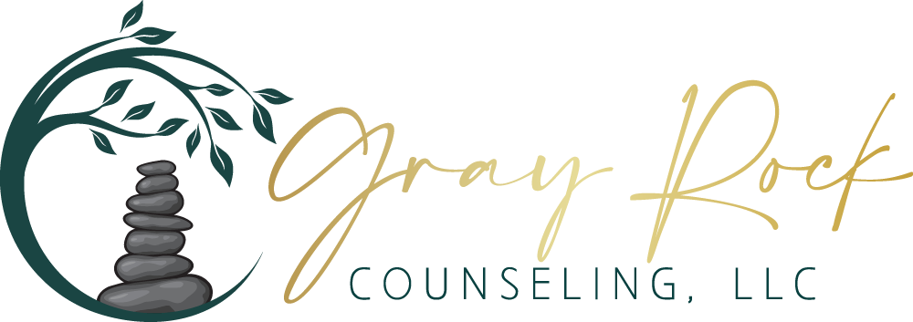 A cartoon-style illustration of a fortune teller with a crystal ball and a stacking rocks sculpture to the left.