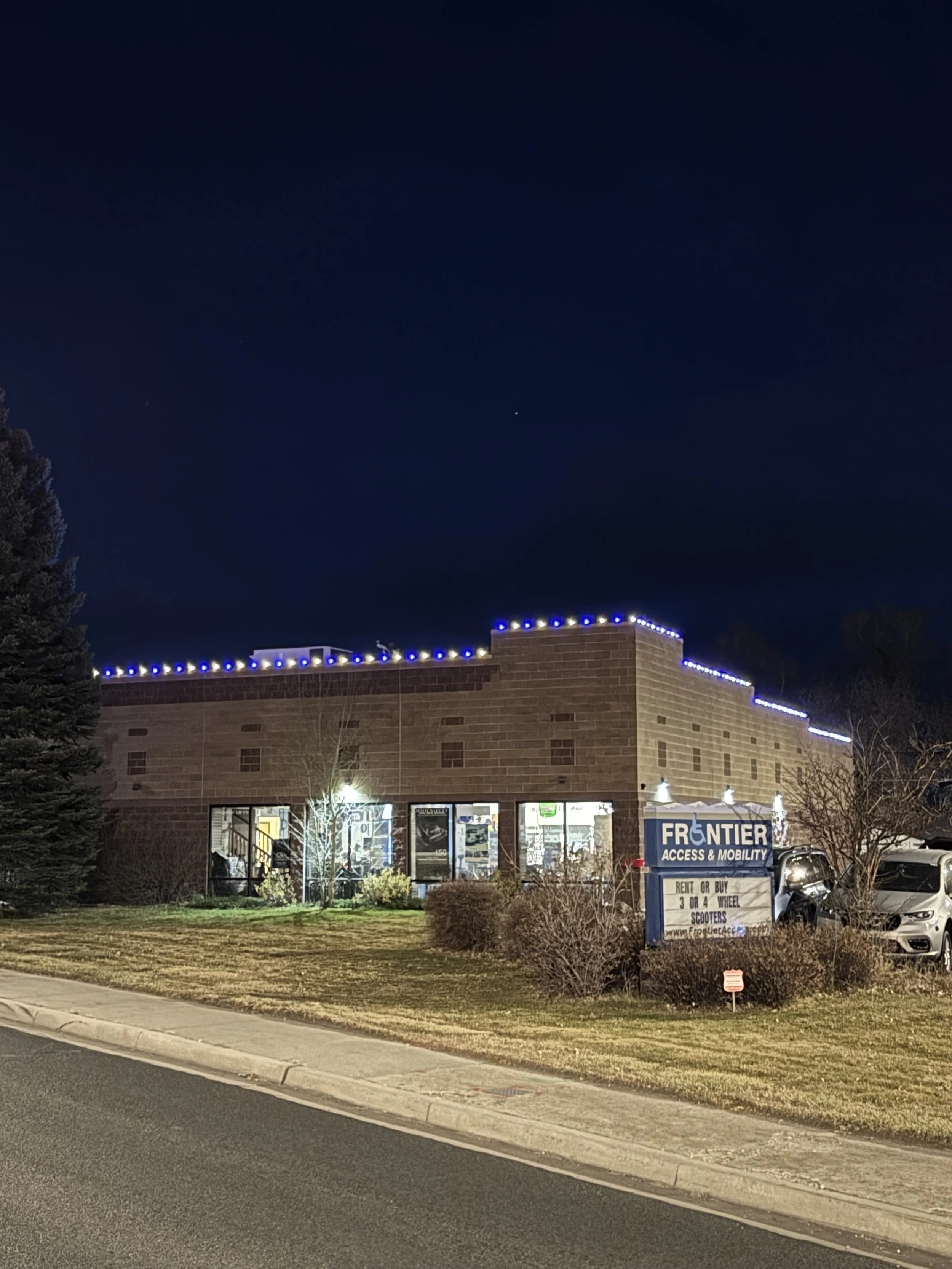 Cheyenne, WY home decorated with the best Christmas near me at night