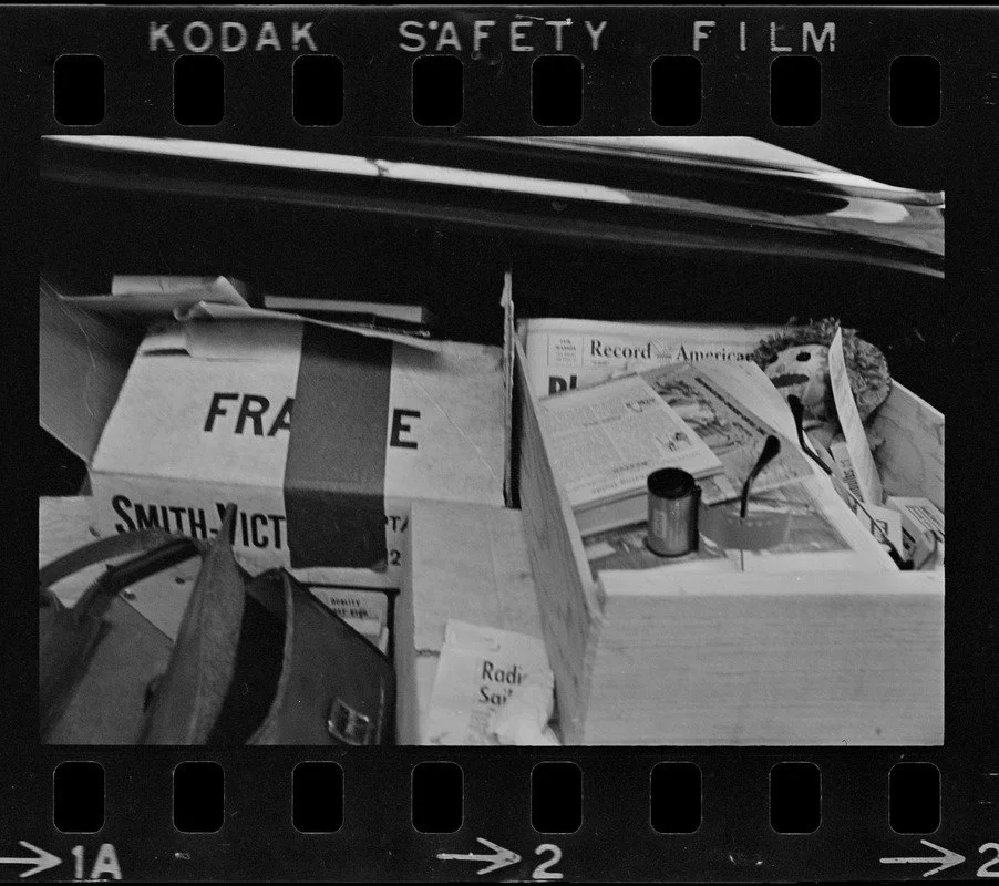Photographic supplies in car trunk, July 1965. Judith Buck. 