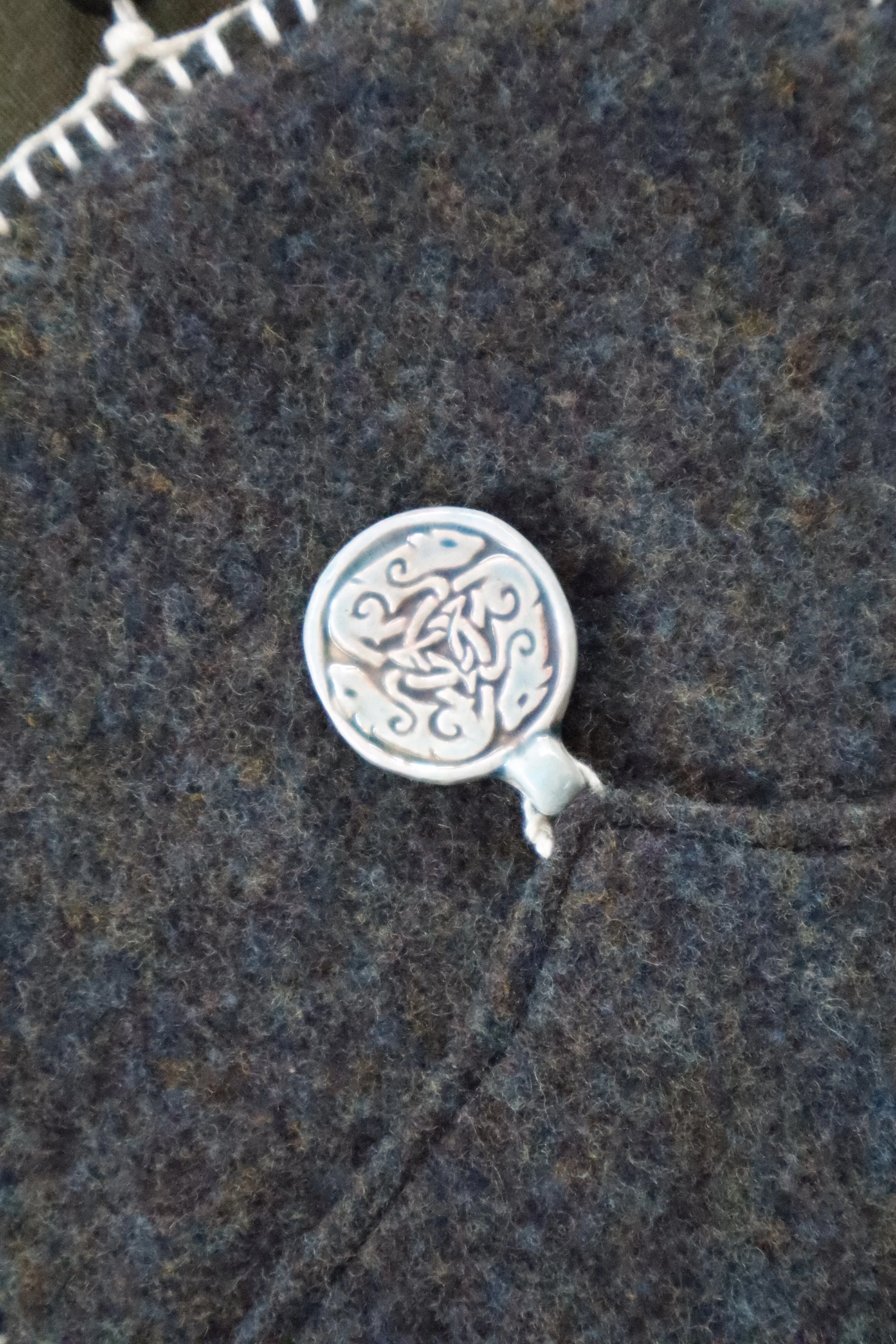 Grey Wool Bag with round clay clasp with triangular design