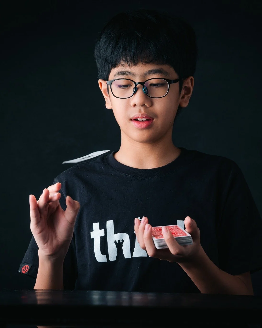 Sure, it looks like a simple trick.
A card flicked into the air.

But behind that moment are hours of practice.
Cards falling all over the place.
The frustration of picking them up again and again.

Focus is not dramatic.
Sometimes it's messy.

These