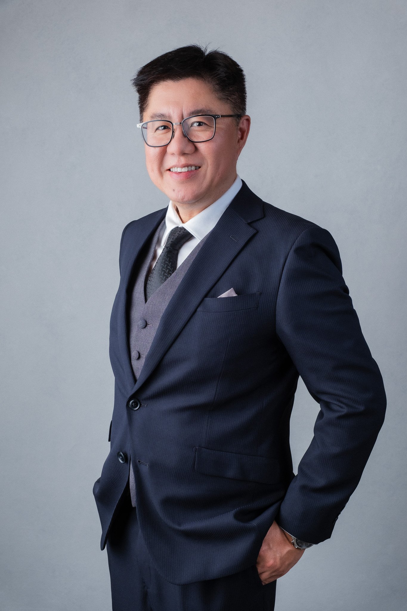 Corporate portrait for John Lim, veteran in finance.
