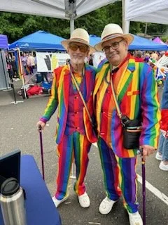 men in rainbow suits.jpg