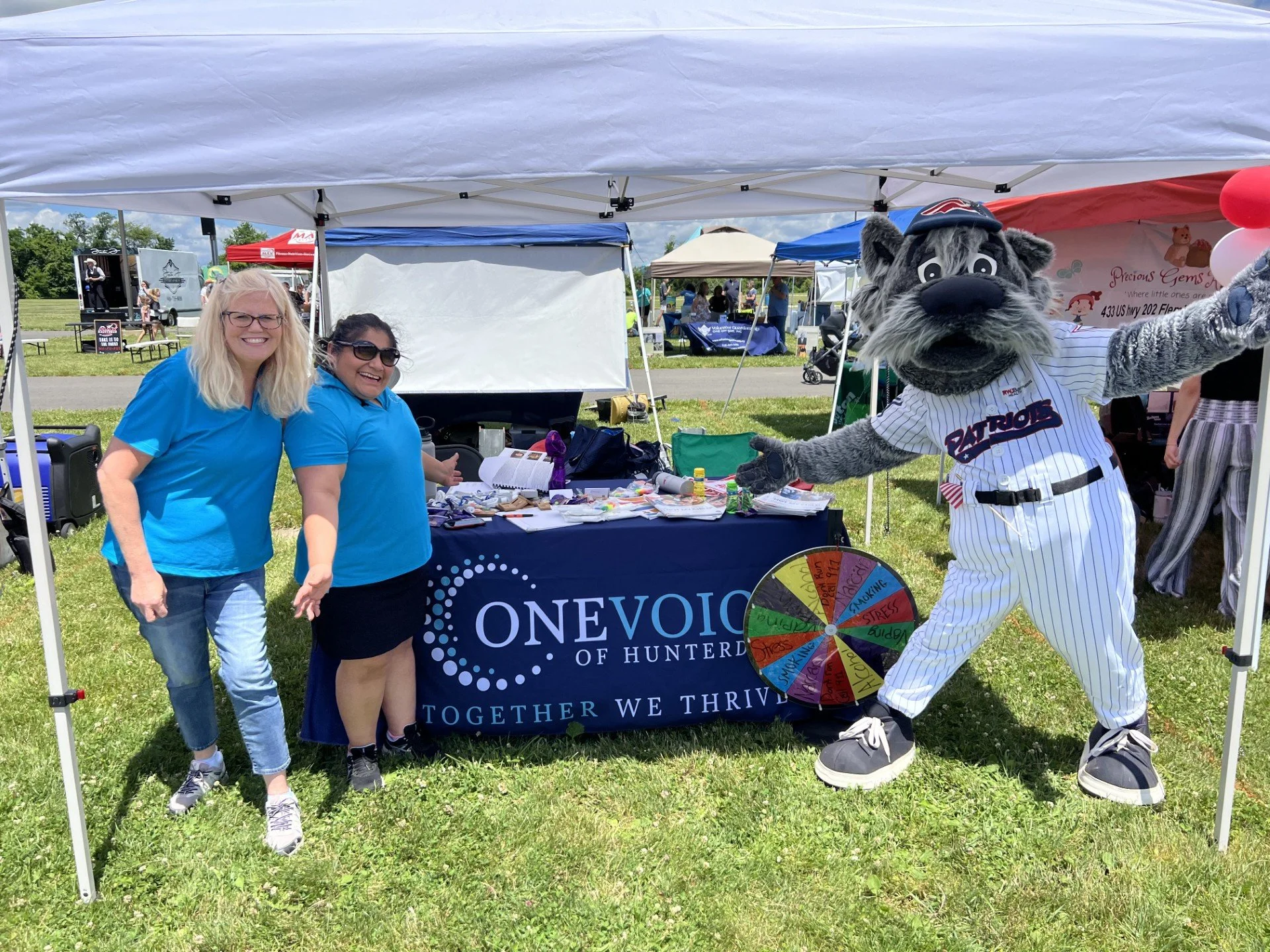 EB CC Mascot at table.jpg