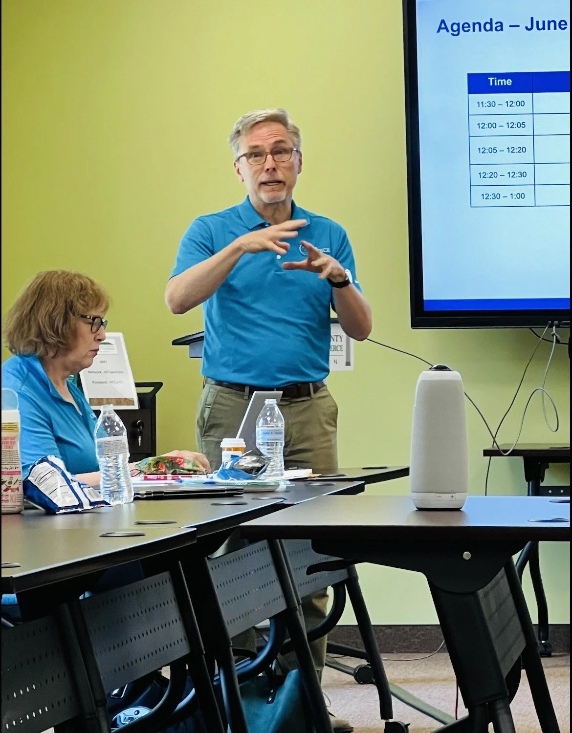 Paul presenting and Nancy.jpg