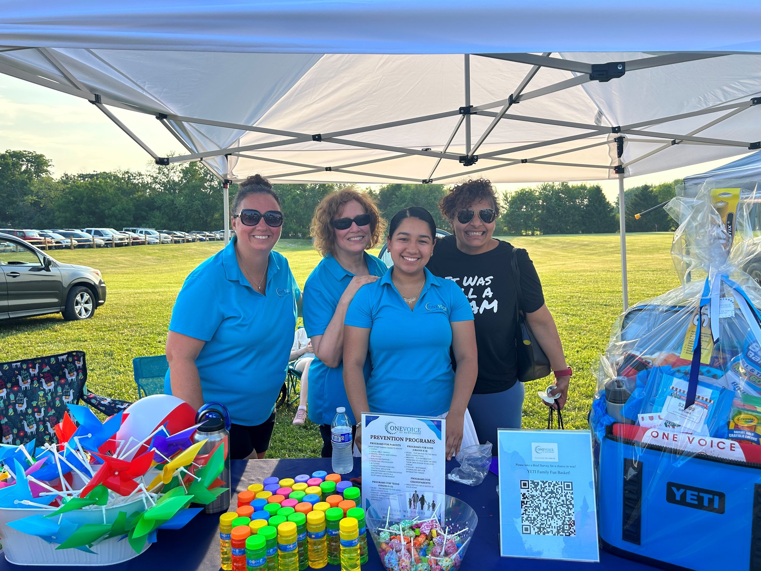 OV Staff with table display Dr. Reeme.jpg