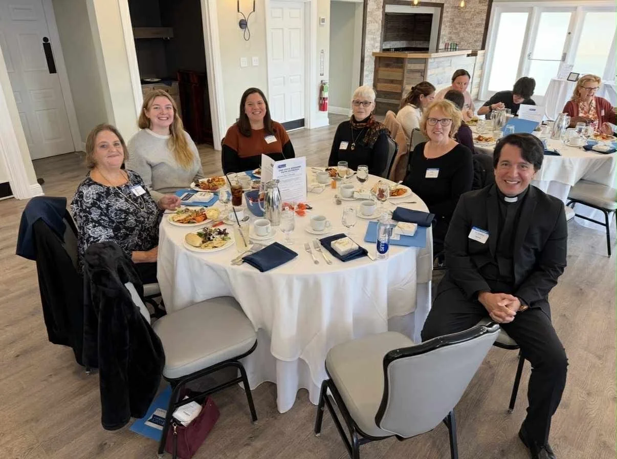 table Amy Cindy Fr Jimmy Kathy Jess Haley.jpg