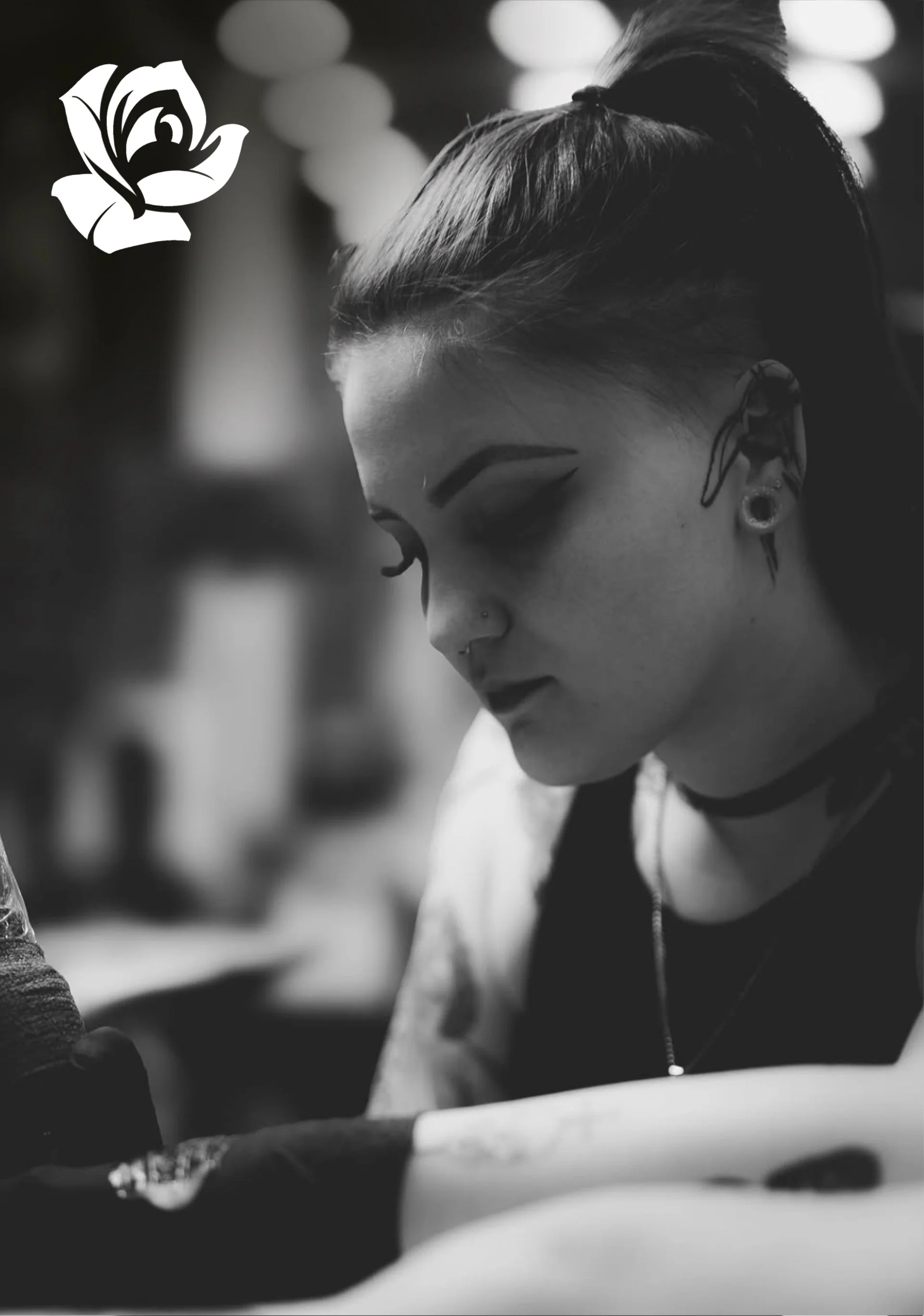 A black and white head shot of artist MaKenzi Groves.