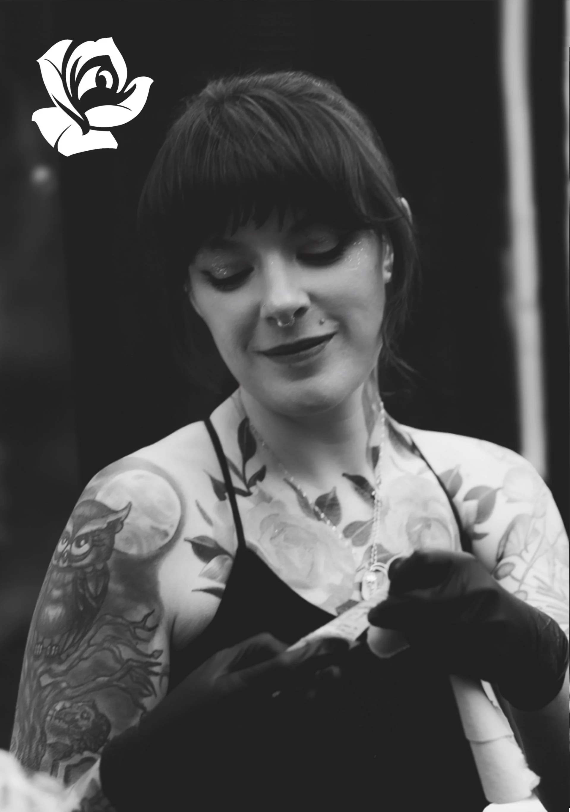 A black and white head shot of artist Allisin Riot