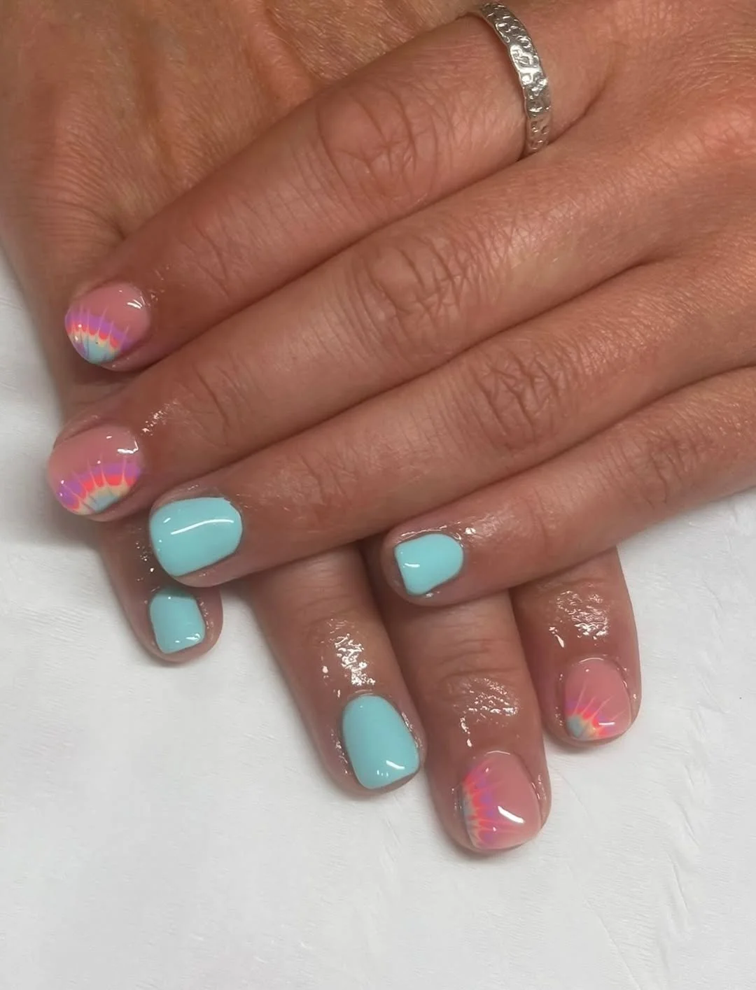 Beauty therapist giving a relaxing manicure