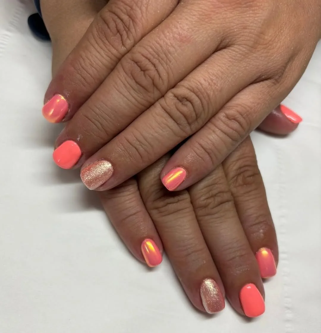 Client receiving a luxurious manicure at Touch of Beauty