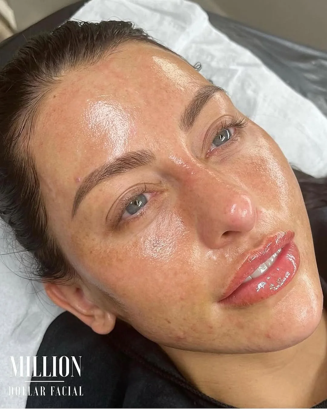 Close-up of facial massage on client’s face