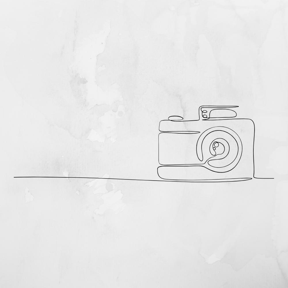 Minimalist line drawing of a vintage camera on a plain background.
