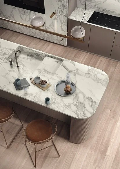 Kitchen island benchtop in Calacatta Magnifico Through Vein porcelain, satin marble-look surface with bold veining