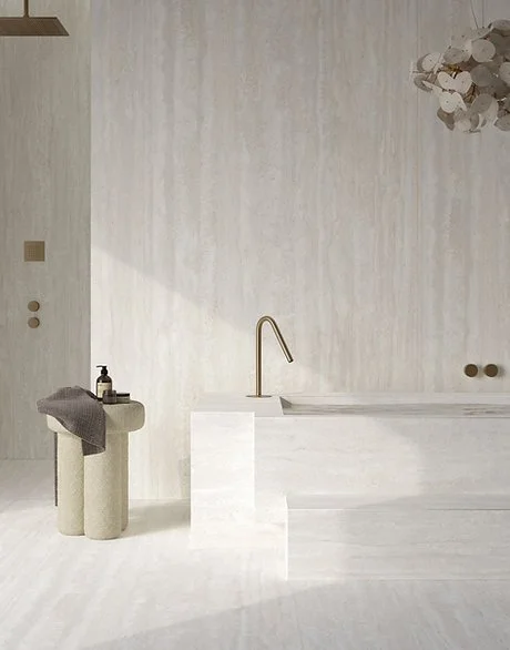Bathroom vanity and wall in Travertino Bianco porcelain, matte light stone-look finish