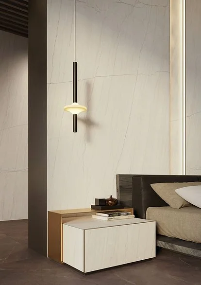 Bedroom feature wall in White Macaubas porcelain, satin ivory quartzite-look surface with fine veining