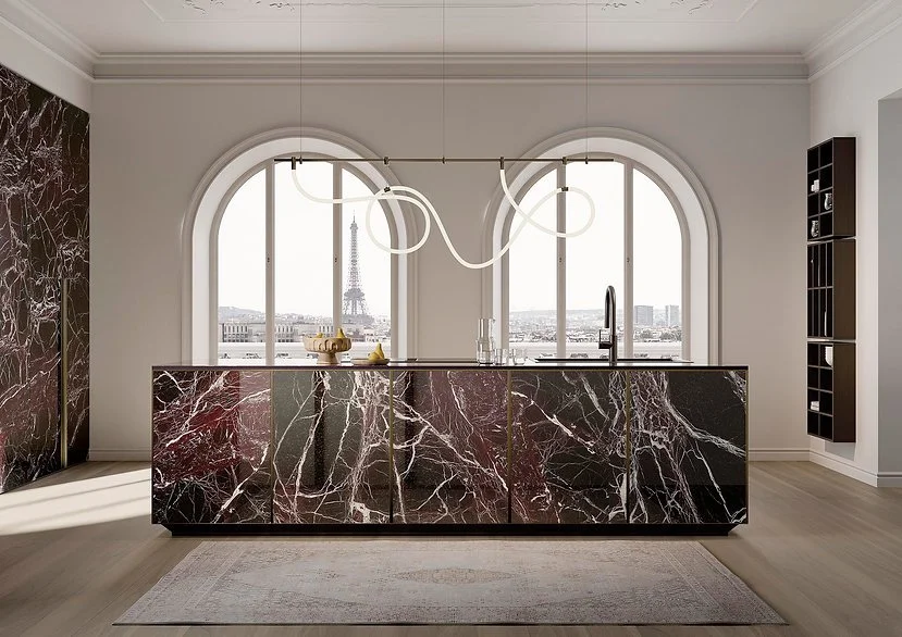 Reception counter clad in Rosso Domus porcelain, polished red marble-look surface with bold veining