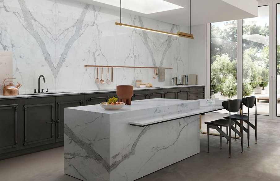 Kitchen interior with Statuario Principe porcelain benchtops and full-height splashback, refined white marble-look finish with light veining