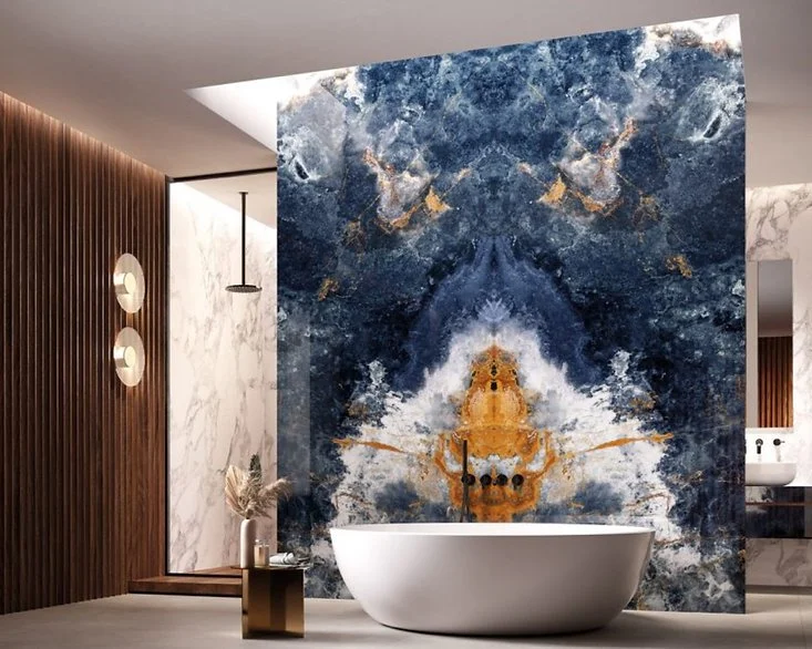 Bathroom feature wall in Ocean Blue porcelain, polished onyx-look surface in deep blue tones