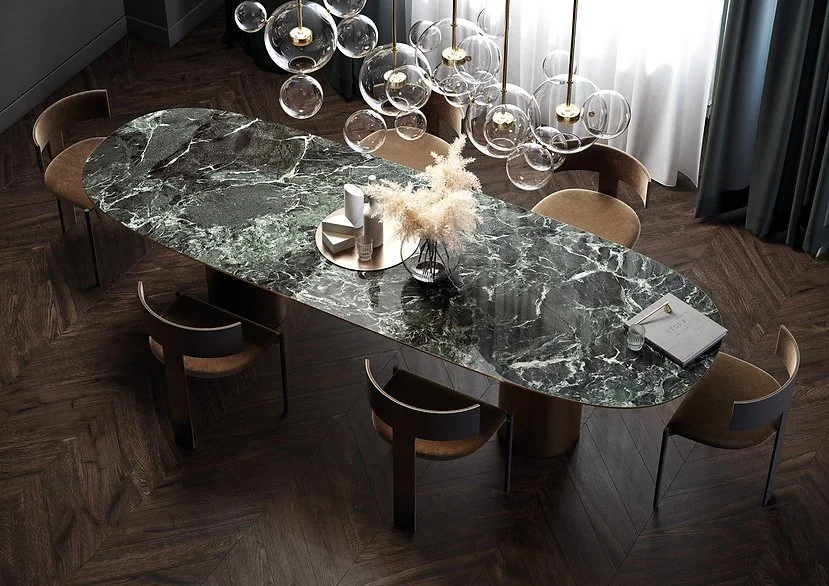 Verde France porcelain dining table surface, green marble-look slab with rich green tones and natural vein structure