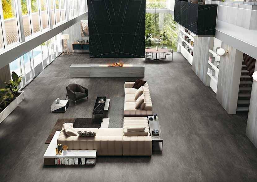 Modern living space with Sahara Noir porcelain feature wall, deep black with gold veining