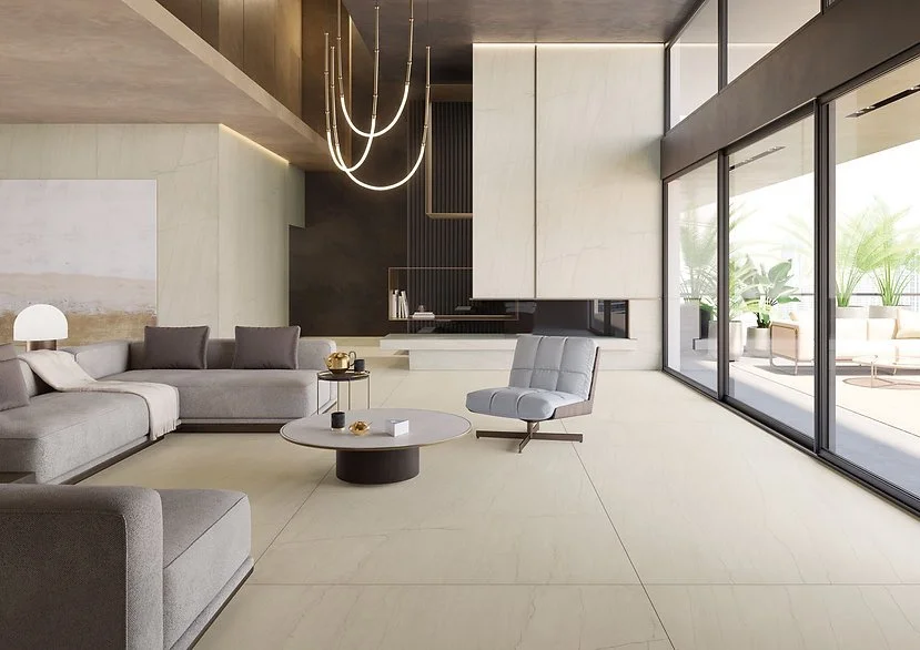 Living room floor in White Macaubas porcelain, satin ivory quartzite-look finish with subtle veining