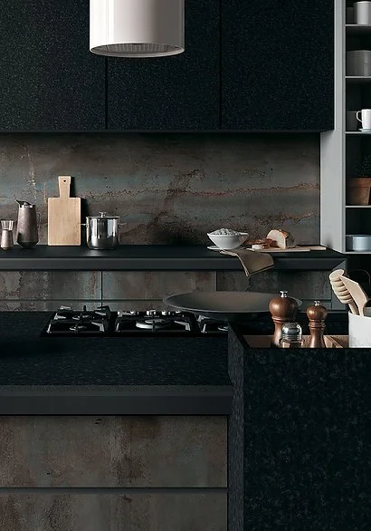 Metal Dark porcelain splashback in a modern kitchen, matte oxidised metal effect