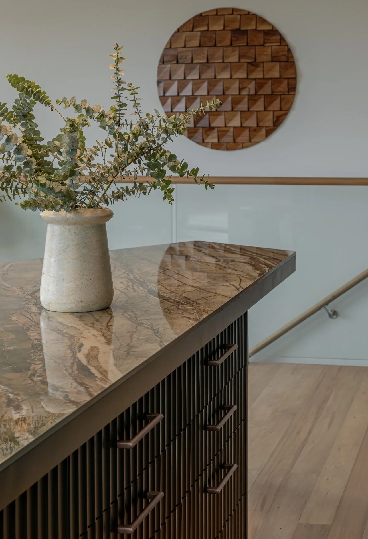 Kitchen island benchtop in Royal Peacock porcelain, polished marble-look surface