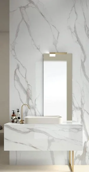 Calacatta Oro porcelain wall detail, satin white marble-look surface with fine gold veining