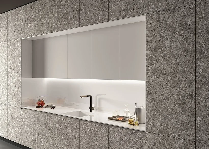 Modern kitchen wall cladding in Milan Stone porcelain, matte grey stone-look finish
