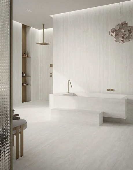 Bathroom wall cladding in Travertino Bianco porcelain, matte light stone-look surface