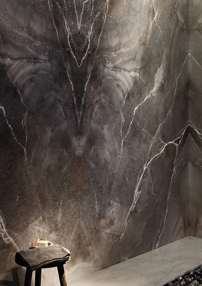 Andromeda porcelain slab, polished black onyx-look surface with dramatic bookmatch veining