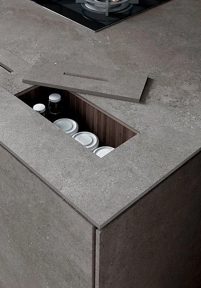Close-up of Buxy Select porcelain benchtop with recessed storage, matte stone-look surface