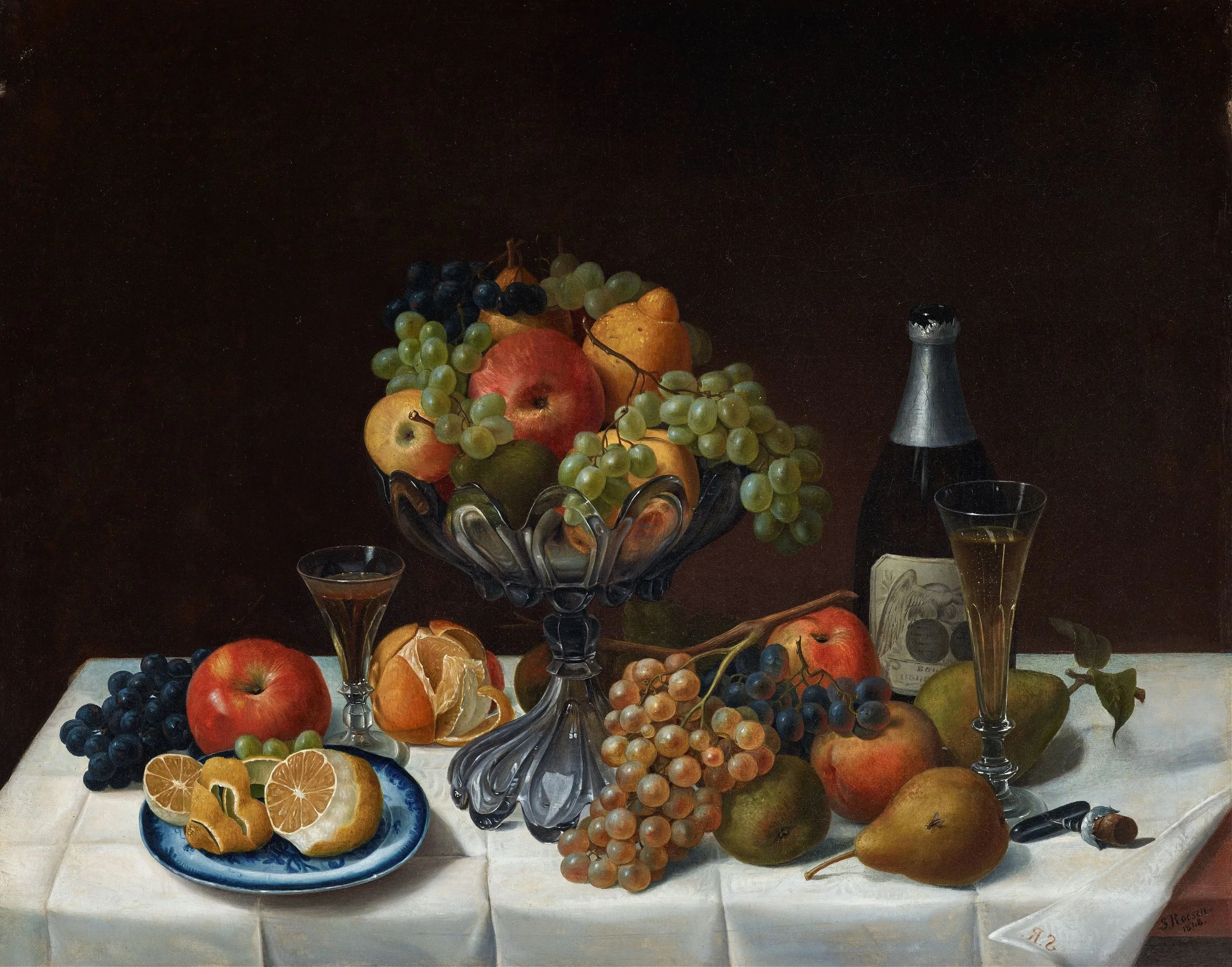 A still life painting of various fruits including apples, grapes, pears, and citrus on a white tablecloth, with a glass of champagne, a bottle of champagne, and a knife.