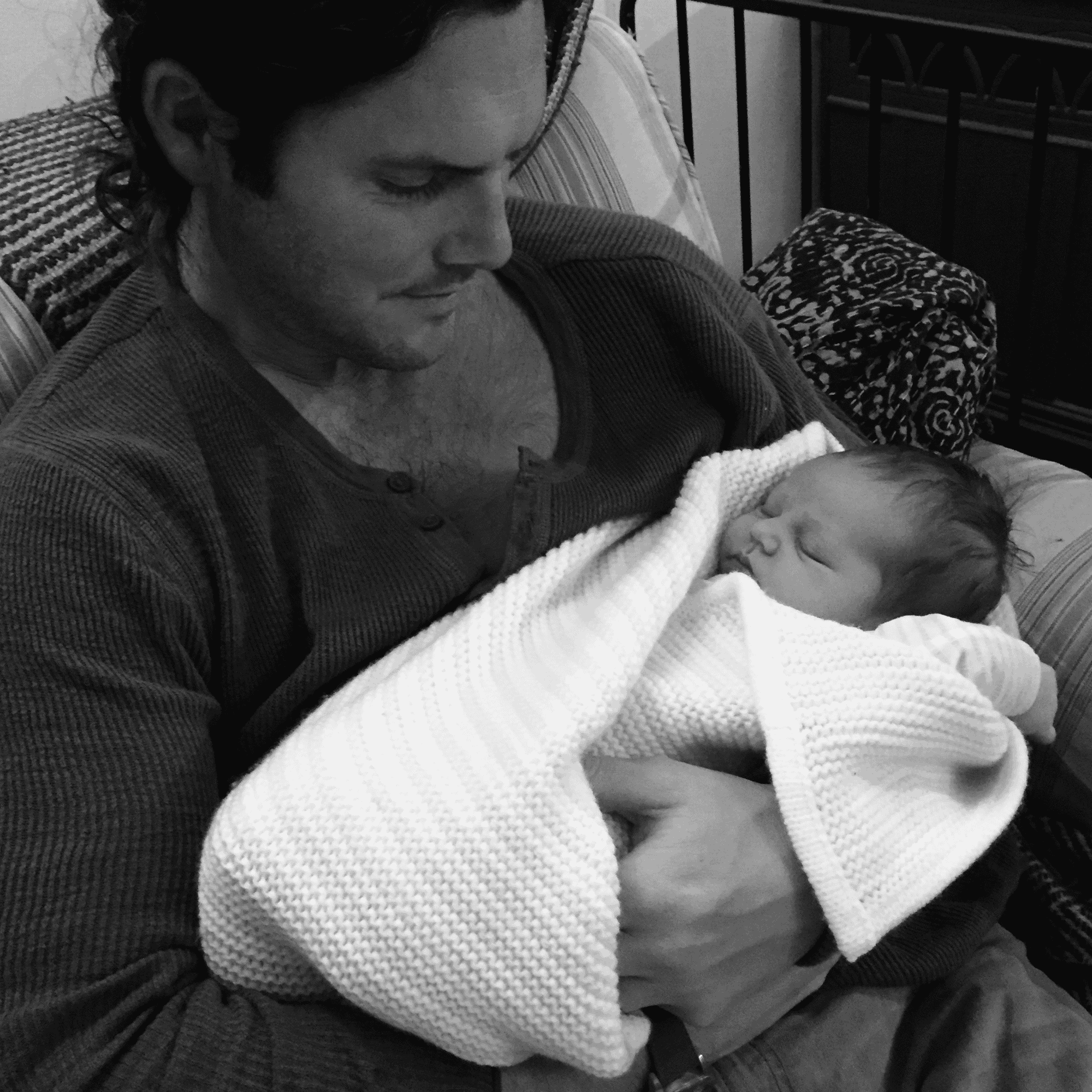 dad and new baby after free birth in Corsham, wiltshire.png