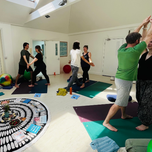 Couples preparing for the birth of their babies in a Yoga and massage workshop at Yogabodhi in Bath